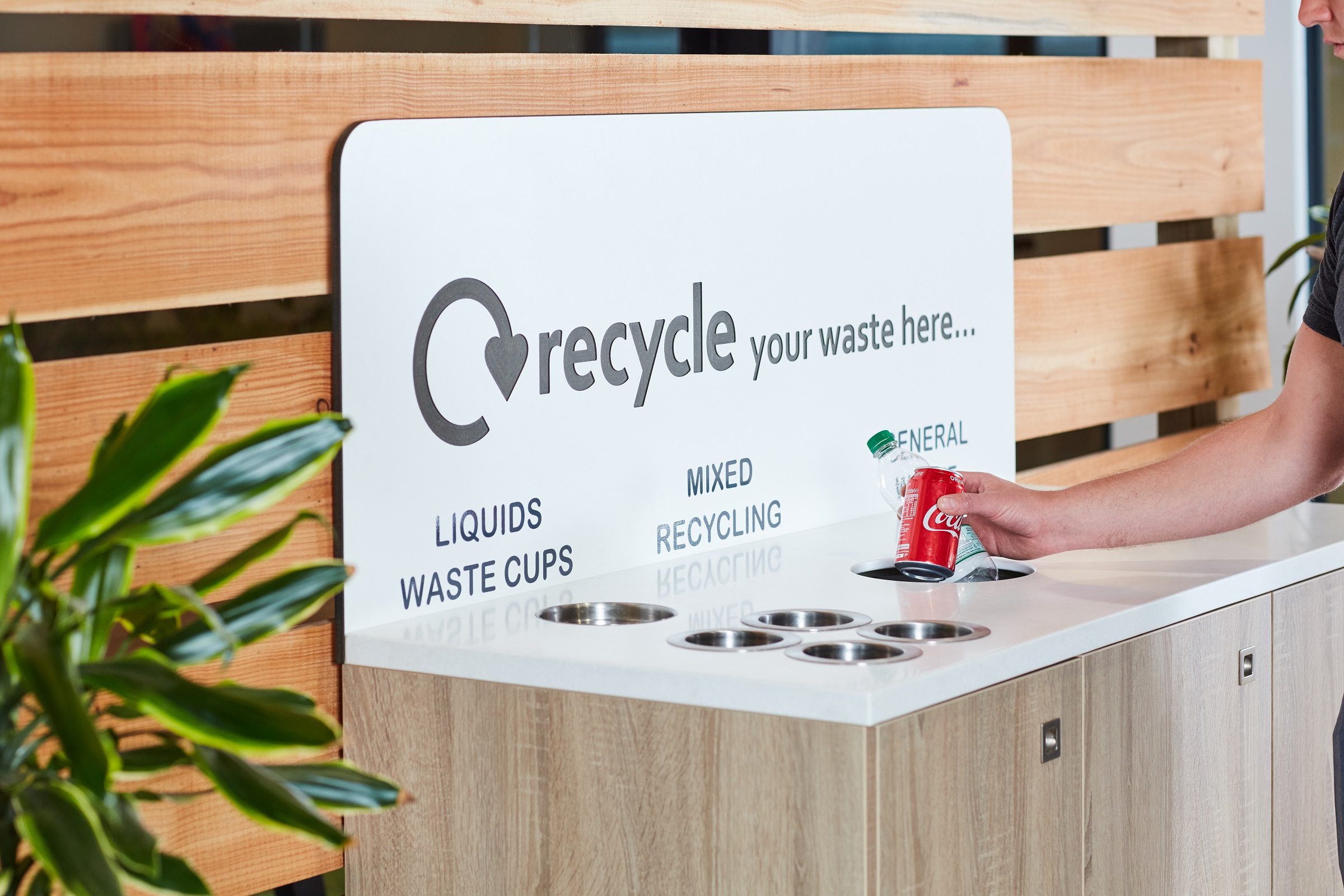 recycling metal cans and plastic bottles to help the environment